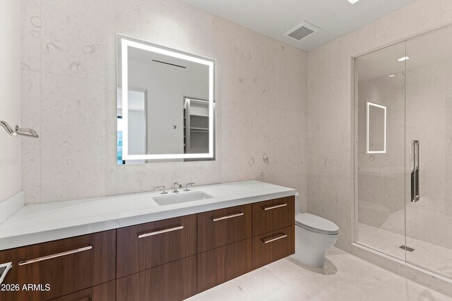 Building Photo - 6587 N Palmeraie Blvd