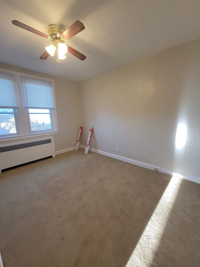 Building Photo - Stunning 4-Bedroom Townhome with Finished ...