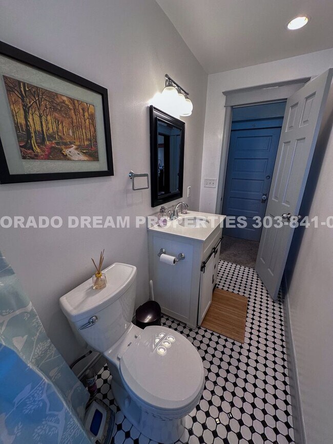 Building Photo - A home where old-world charm meets modern sophistication!