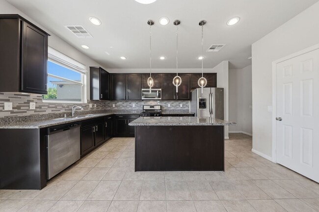 Building Photo - Mountains Edge Gem with Loft, Den & Upgraded Kitchen