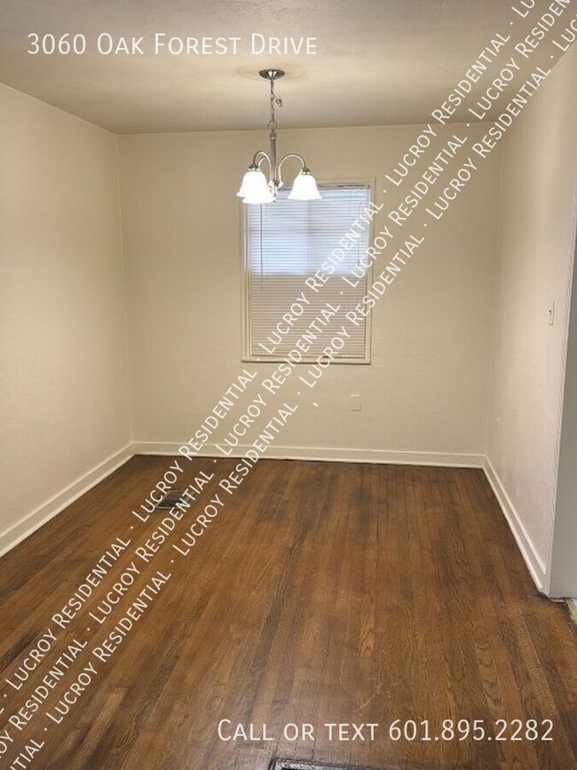 Building Photo - 3-Bedroom Home with Hardwood Floors in Jac...