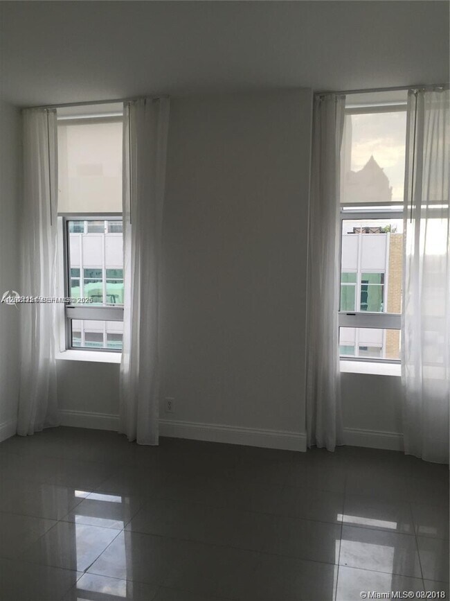 Building Photo - 111 E Flagler St