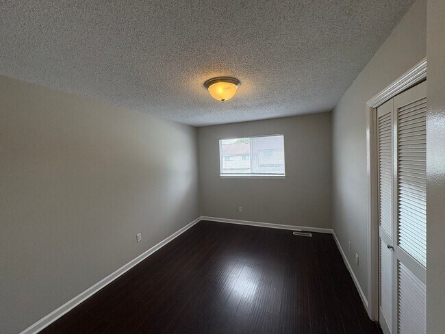 Building Photo - Four Bedroom Townhome Available Now