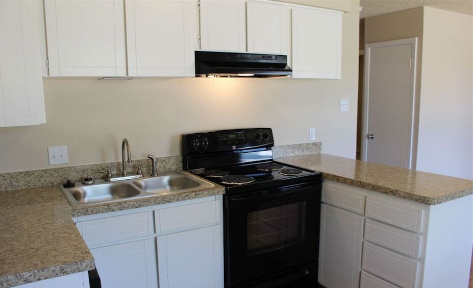 Kitchen sink and stove/oven - 7608 Abbott Drive