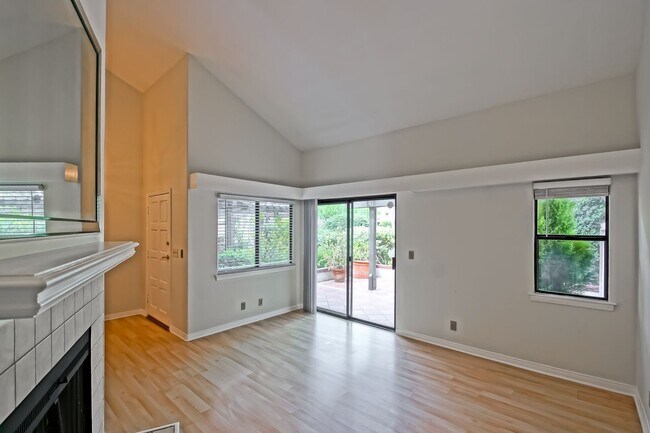 Building Photo - PRIME POOLFRONT LOCATION & CLOSE TO MAIN GATE! BRIGHT & SPACIOUS, END-UNIT POOLFRONT TOWNHOUSE W/...