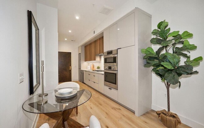 Building Photo - One Bedroom Condo in the Heart of the City + Rooftop Deck **Half Month Free on 12 Month Lease**