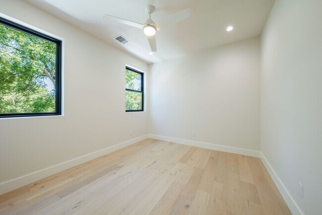 Building Photo - Luxury Redefined: Experience Vibrant Living in this 3-Bedroom Haven in East Austin