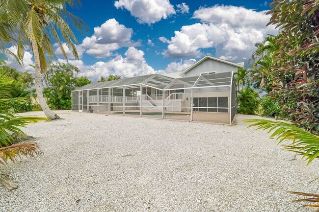 Building Photo - **Direct Gulf Access Pool Home! 4 BED/3 BA...