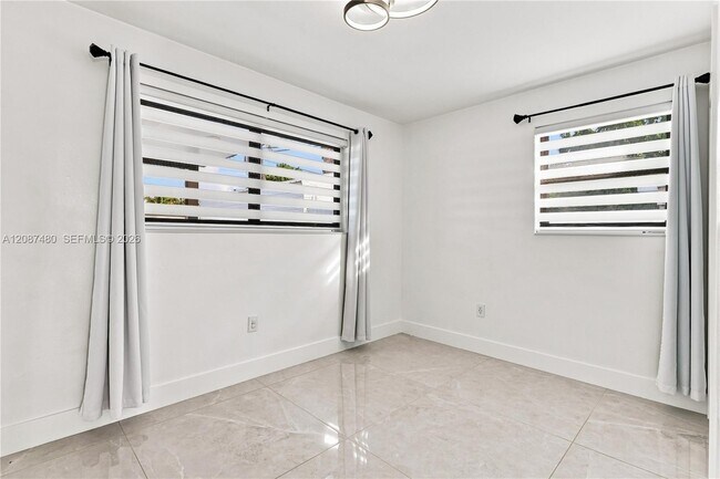 Building Photo - 9298 Jamaica Dr