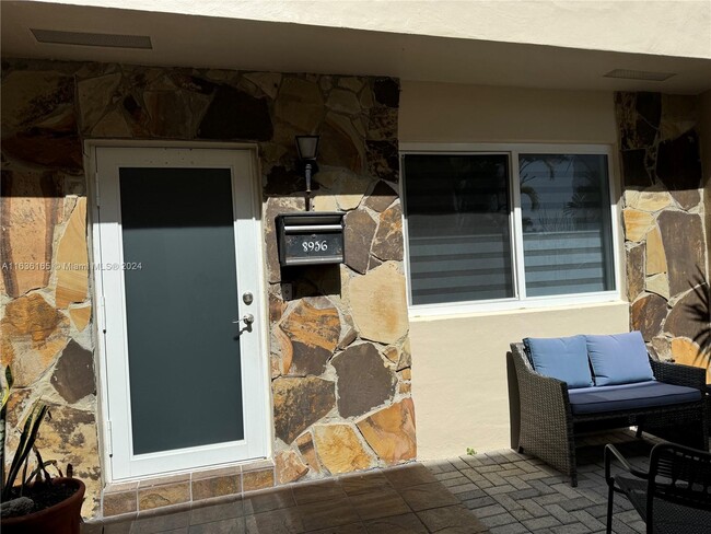 Building Photo - 8956 Collins Ave