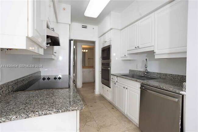 Building Photo - 4779 Collins Ave