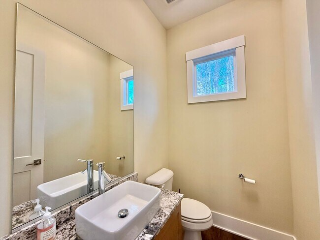 Building Photo - Modern 4BD, 3.5BA Raleigh Home on a Corner Lot with a 2-Car Attached Garage & Private Backyard in...