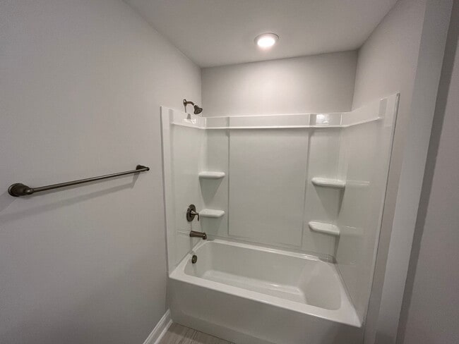 Building Photo - Newly Built 4BD, 3BA Cary Townhome with Modern Amenities and Screened-In Patio