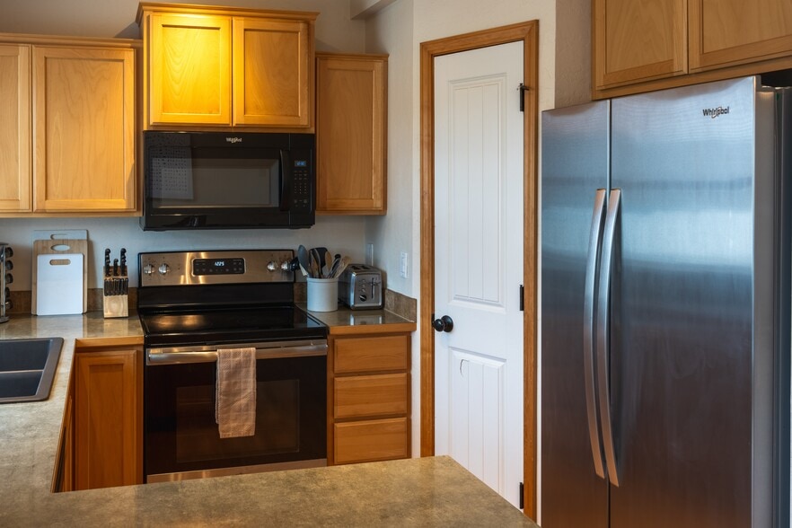 Kitchen - Large Pantry - Keurig and traditional coffee maker included. Brand new Stainless fridge - 2805 W Dumont Dr