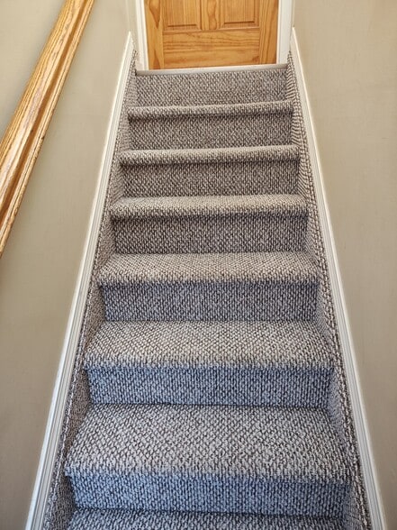 Stairs up to second floor - 32 Scooter Ln