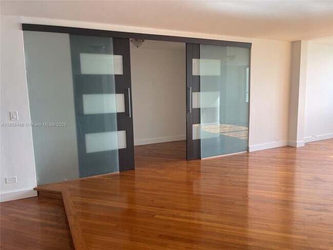 Building Photo - 5005 Collins Ave