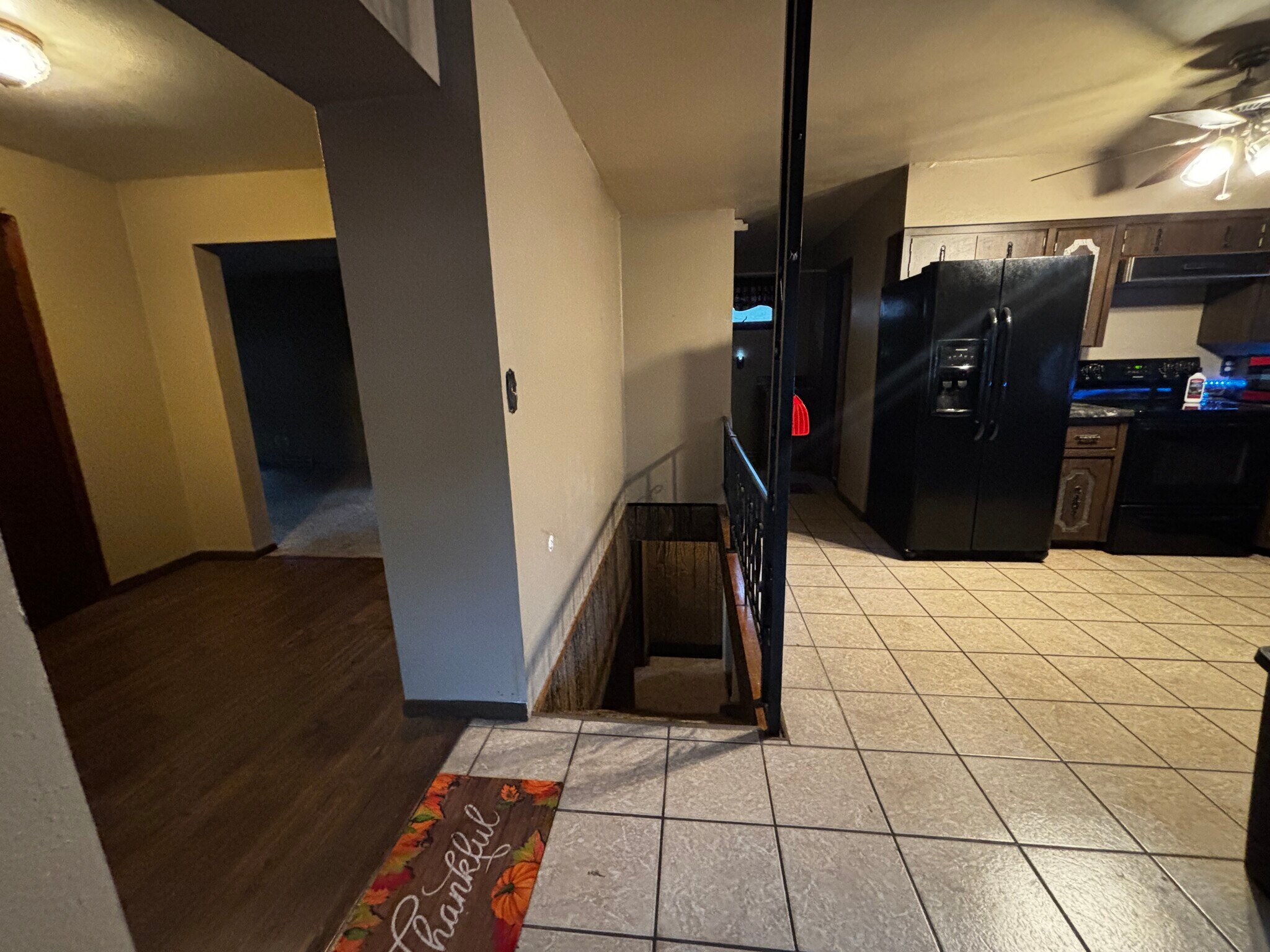 Nook to the left, stairs to bonus room, hall to laundry & full bath, kitchen on the right. - 829 W 5th Ave