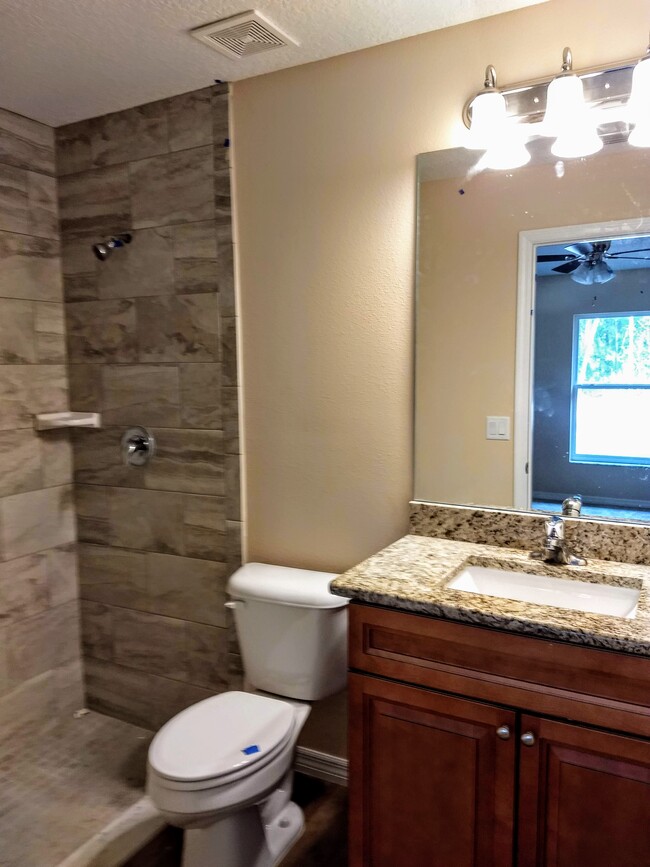 Main bedrroom bathroom - 9356 N Peachtree Way