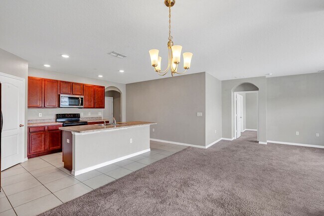 Building Photo - Sunny, Move-In Ready 4-Bed Home in Winter Haven with Modern Finishes and Two-Car Garage
