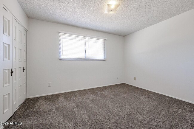Building Photo - 5333 W Port Au Prince Ln
