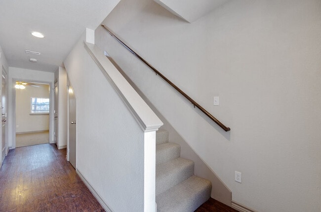 Stairs and hallway to bedroom on first floor - Tinsley Place
