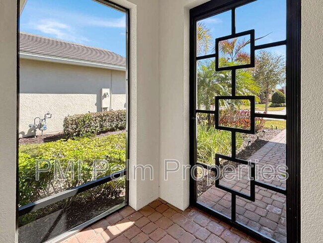 Building Photo - 9870 SW Trumpet Tree Cir