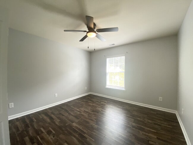 Building Photo - Three Bedroom Home with fenced-in Backyard oasis!