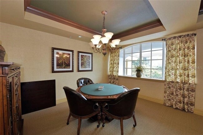 Building Photo - Annual UNfurnished 2/2 condo on top floor ...