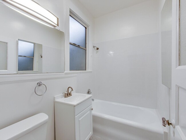 Building Photo - Bright, Renovated 1BD with In-Unit W/D and...