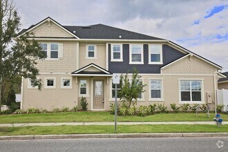 Building Photo - Beautifully Appointment 3/2 Modern Townhom...