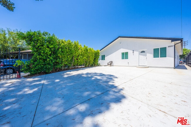 Building Photo - 5837 Cartwright Ave