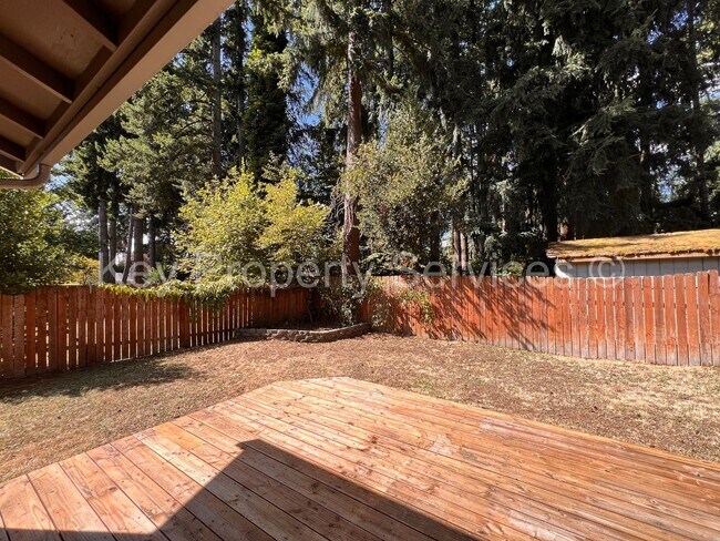 Building Photo - Orchards Ranch with Large Fenced Yard - Re...