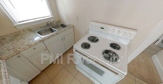 Building Photo - 8944 1st Ave