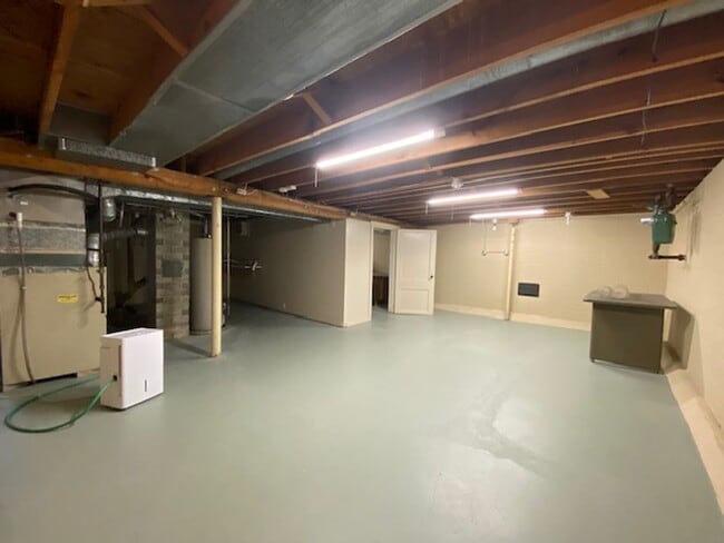 Building Photo - Welcome to this charming three-bedroom, tw...