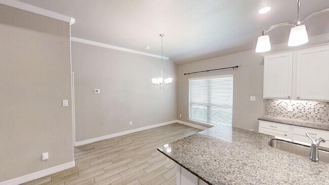 Building Photo - "Charming 4-Bedroom Retreat with Granite Elegance & Cozy Fireplace in Killeen!"