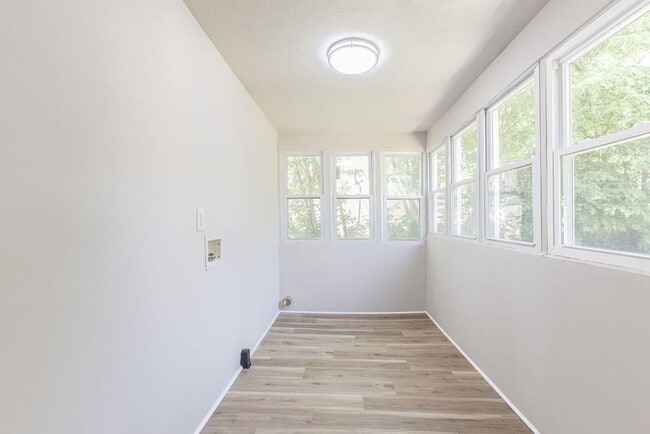 Building Photo - Remodeled 2-Bedroom Bungalow with Spacious Yard & 1-Car Basement Garage