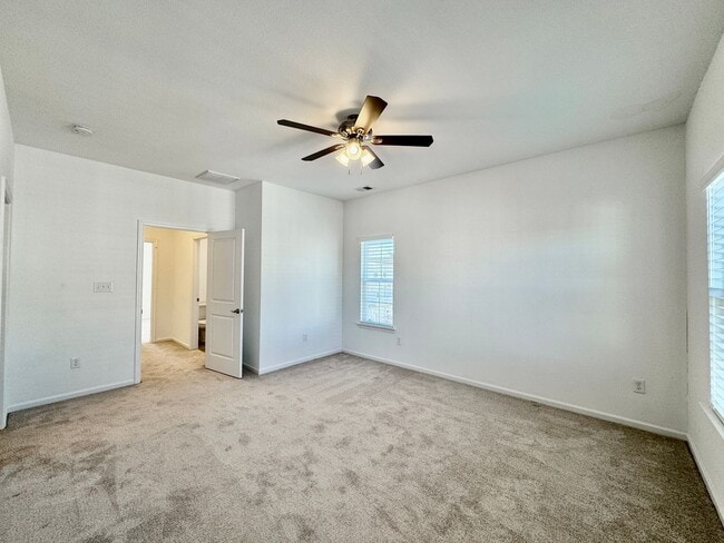 Building Photo - 3 Bedroom Townhome in Spence Crossing! Water/Sewer/Trash/Landscaping INCLUDED! - Attached Garage ...
