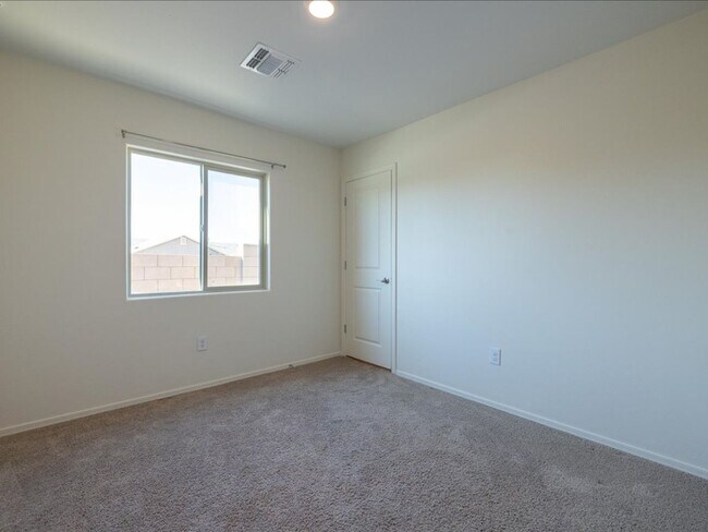 Building Photo - Spacious 4-Bedroom Home with Open Layout & Turf Backyard