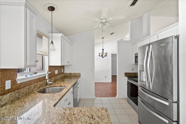 Building Photo - 10334 Triple Crown Ave