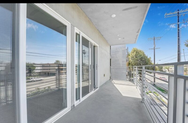 Building Photo - 7040 Woodman Ave