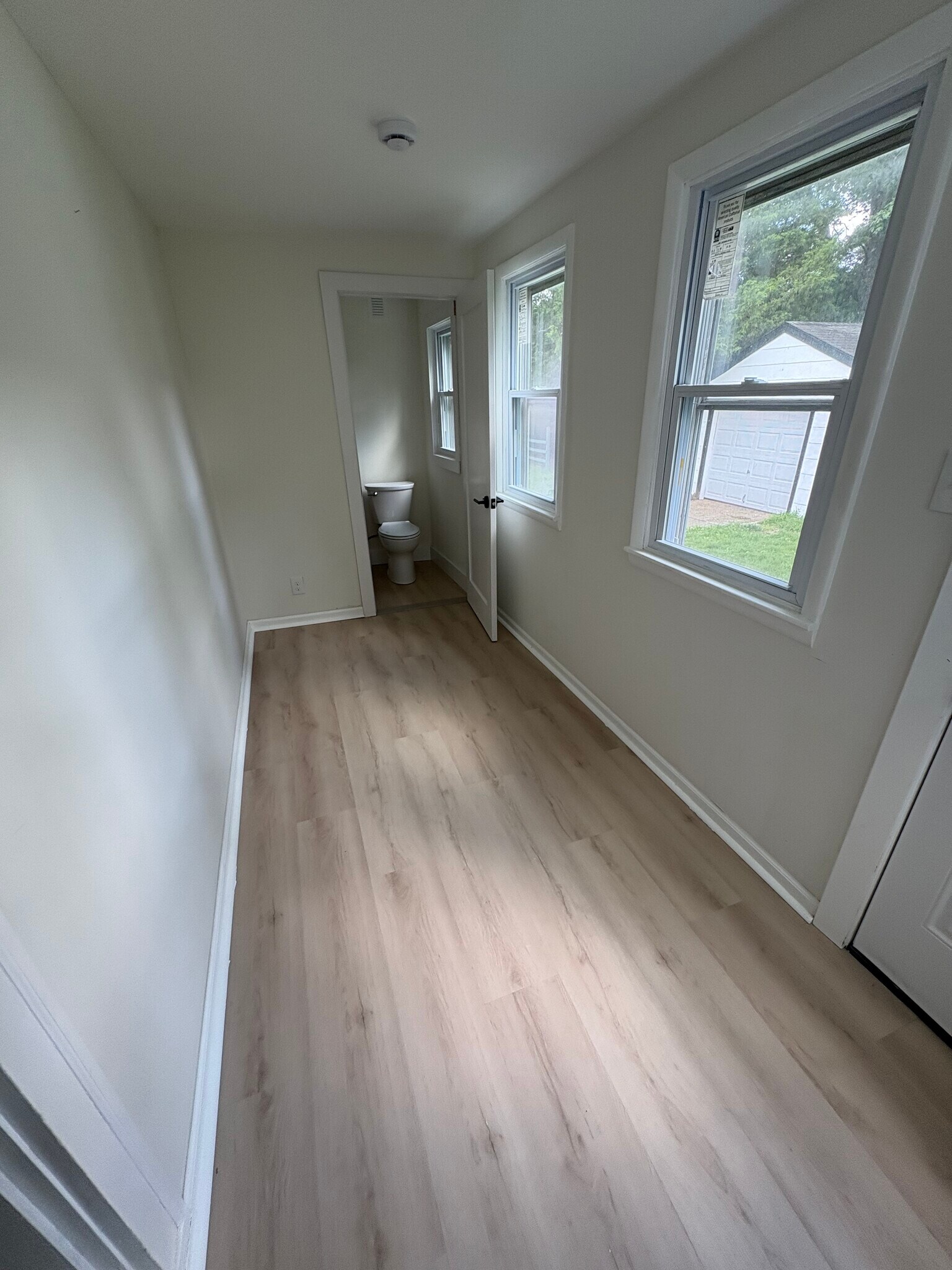 Mud room to large backyard with a half bath - 117 Green Ln