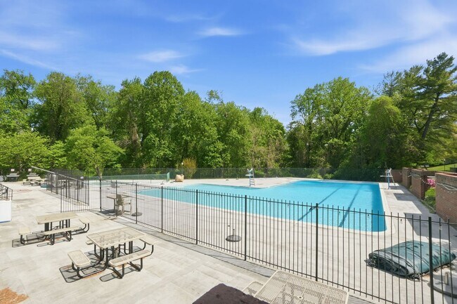 Building Photo - This expansive ground level residence is set within a serene, gated garden community surrounded b...