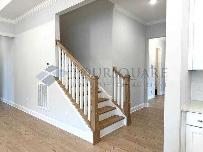 Building Photo - Elegant 4-Bed / 3.5-Bath Home with Main-Level Primary Suite, Quartz Kitchen & 3-Car Garage – In H...