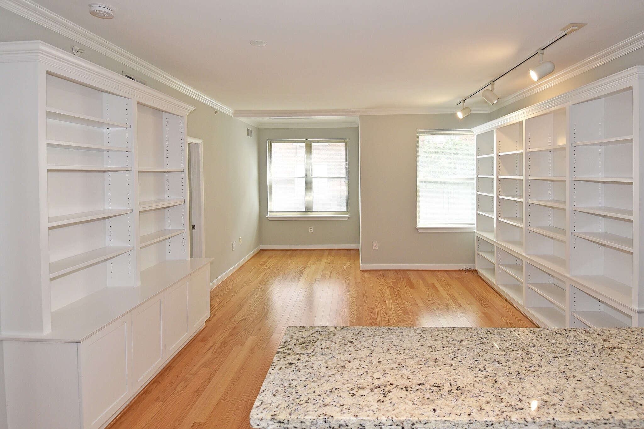 Large living room with dining area and built-ins - 1445 N St NW