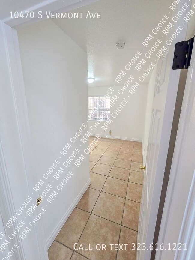 Building Photo - 10470 S Vermont Ave