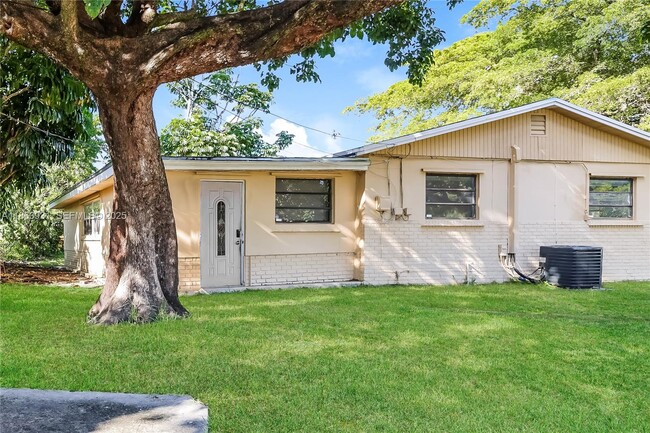 Building Photo - 5801 Royal Palm Blvd