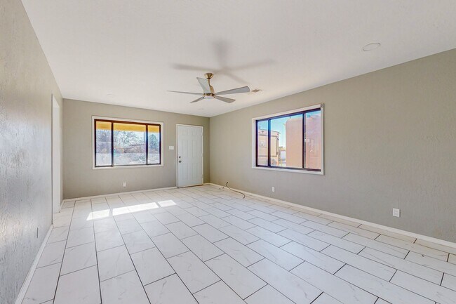 Building Photo - NE PUEBLO STYLE 3 Bedroom 2 Bath 1824/SF