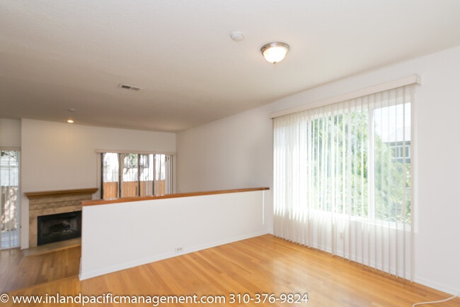 Building Photo - Private Rear Corner Townhome with Patio an...