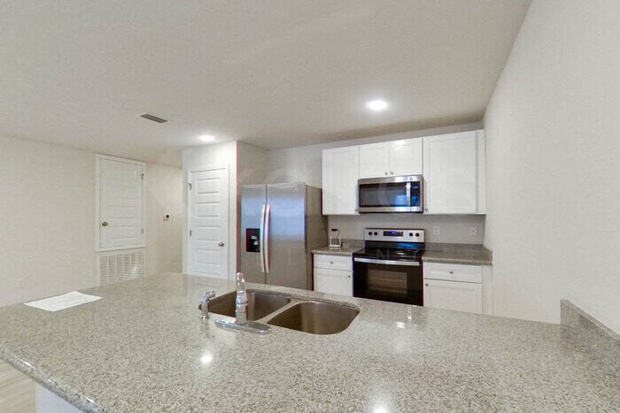 Building Photo - 4739 Malay Cir