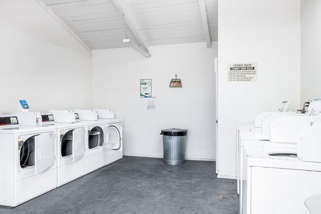 2 laundry rooms, each with 4 washers and dryers - 250 E San Jose Rd